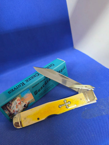 Guardian Angel Lock Back Cheetah Knife Yellow Bone Handles 4 3/8" EM2567052YBN