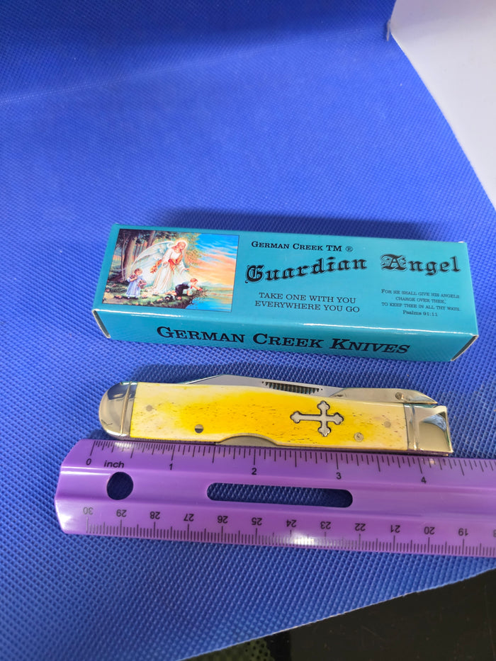 Guardian Angel Lock Back Cheetah Knife Yellow Bone Handles 4 3/8" EM2567052YBN