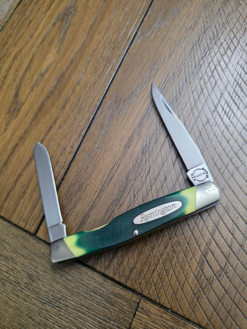Remington USA - 9506 Moose with Green Sawcut Delrin Handles Unused