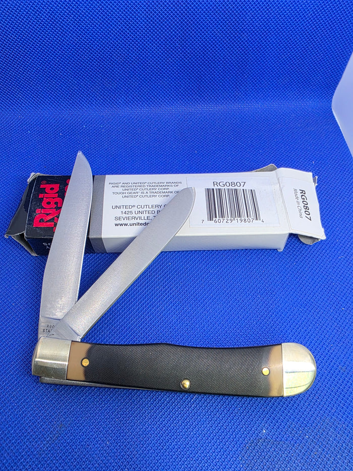 Rigid Trapper Sawcut Delrin Handles NIB RG0807 by United Cutlery